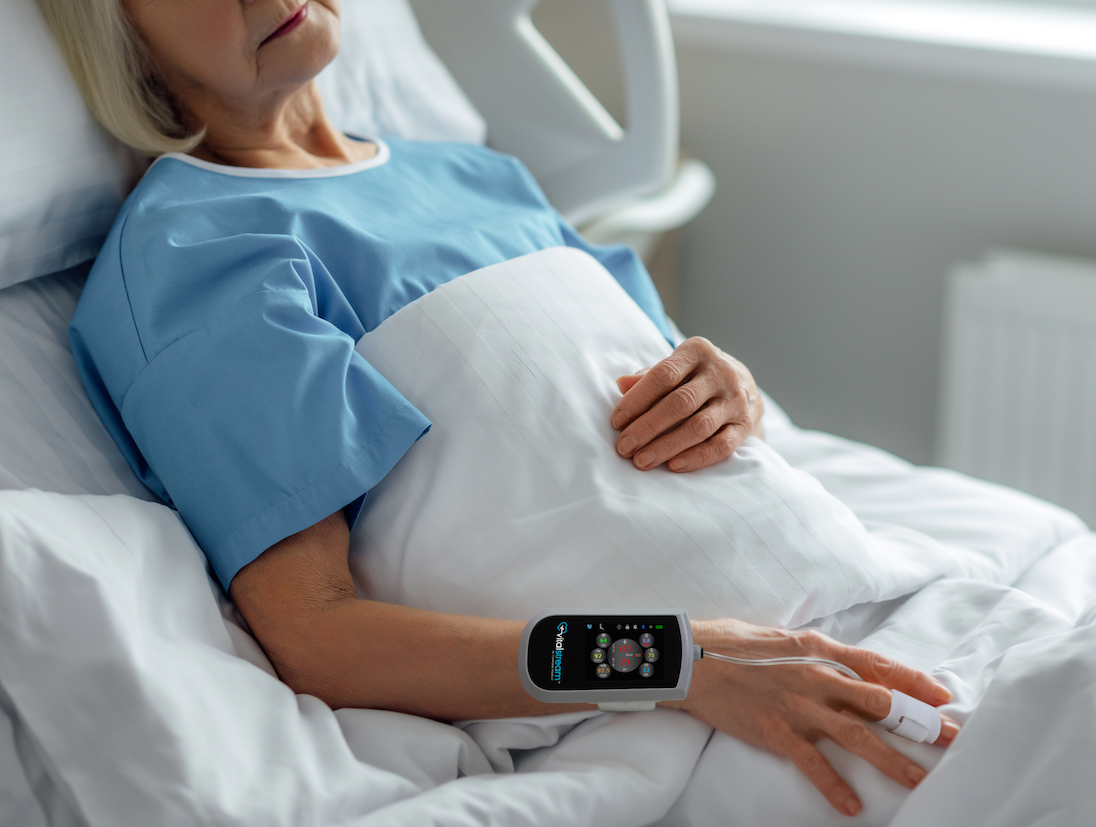 cropped view of senior woman lying in hospital bed
